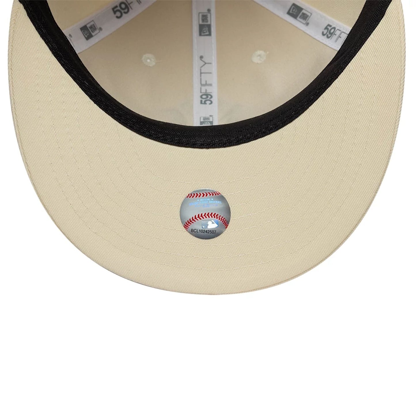 Pictured is this MLB Baseball Stitch New York Yankees Retro Crown 59FIFTY Fitted cap in Cream. 7