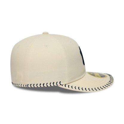 Pictured is this MLB Baseball Stitch New York Yankees Retro Crown 59FIFTY Fitted cap in Cream. 6