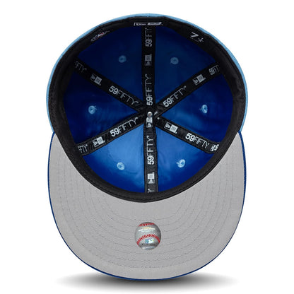 Pictured is this MLB Multi Logo Kansas City Royals 59FIFTY Fitted cap in pastel blue. 2