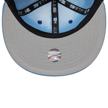 Pictured is this MLB Multi Logo Texas Rangers 59FIFTY Fitted cap in dark blue. 2