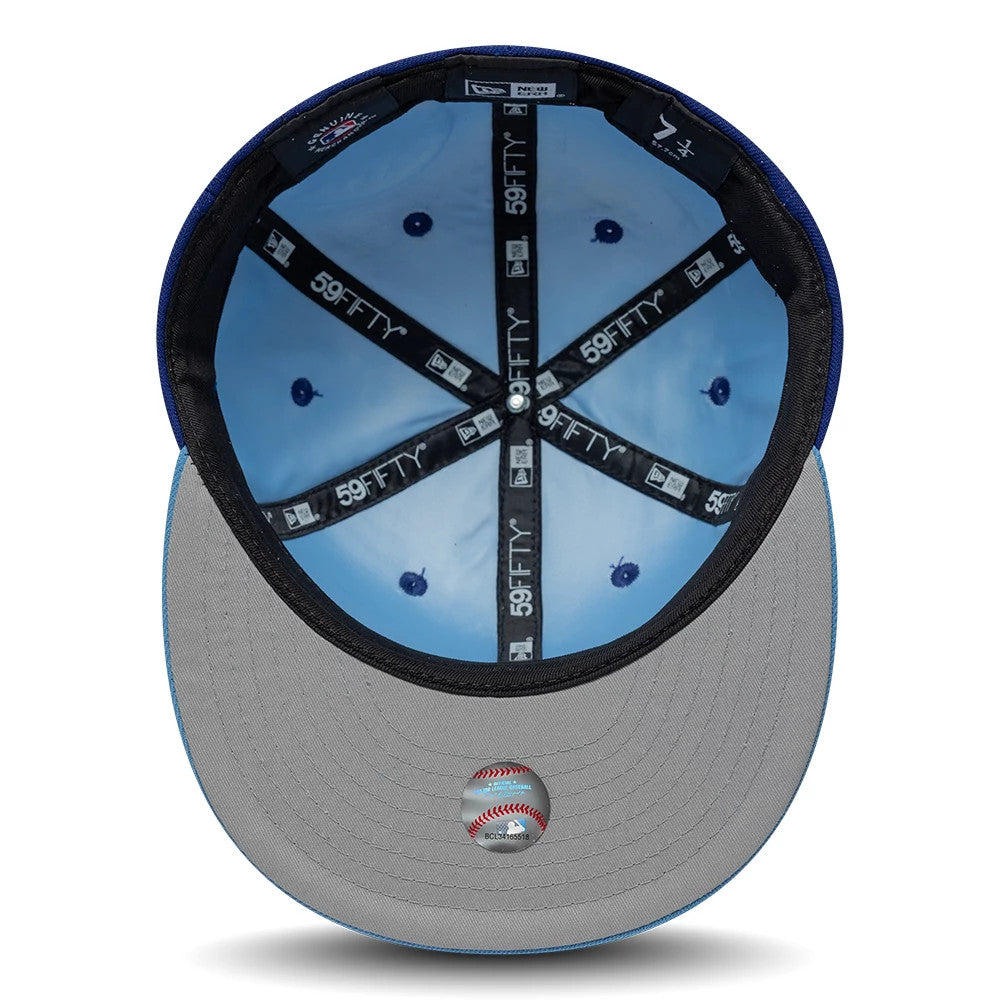 Pictured is this MLB Multi Logo Texas Rangers 59FIFTY Fitted cap in dark blue. 2
