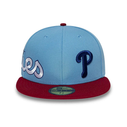 Pictured is this MLB Multi Logo Philadelphia Phillies 59FIFTY Fitted cap in pastel blue. 3