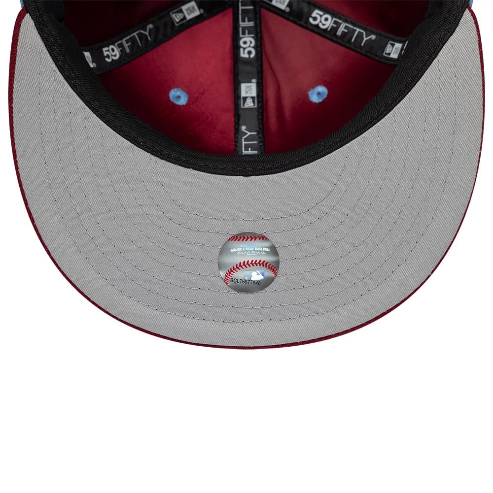 Pictured is this MLB Multi Logo Philadelphia Phillies 59FIFTY Fitted cap in pastel blue. 2