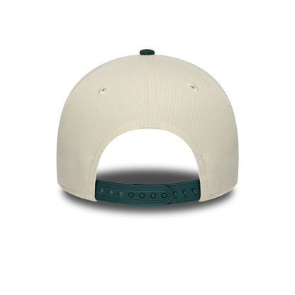 Pictured is this MLB Side Hit Athletics 9FORTY E-Frame cap in Cream. 7