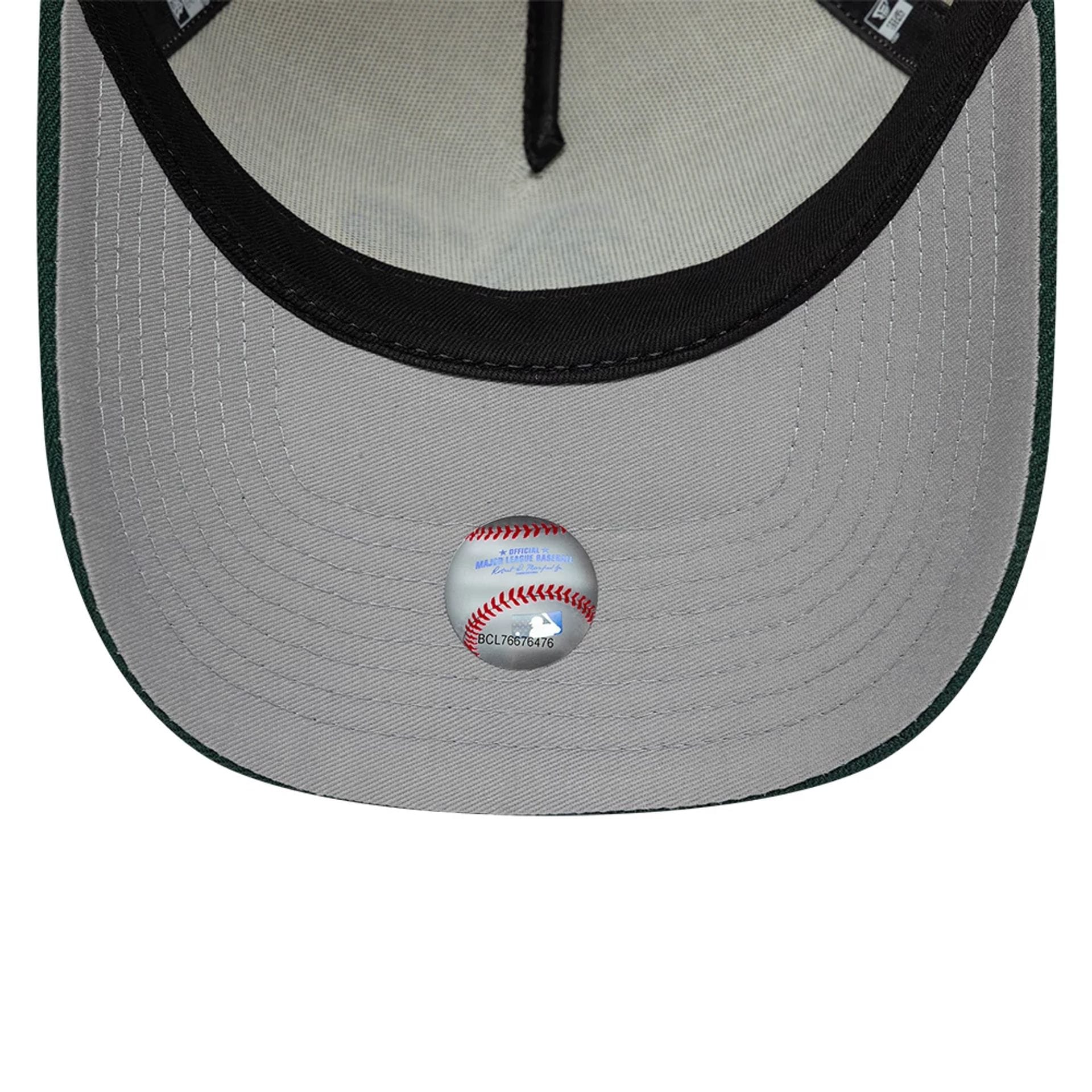 Pictured is this MLB Side Hit Athletics 9FORTY E-Frame cap in Cream. 2