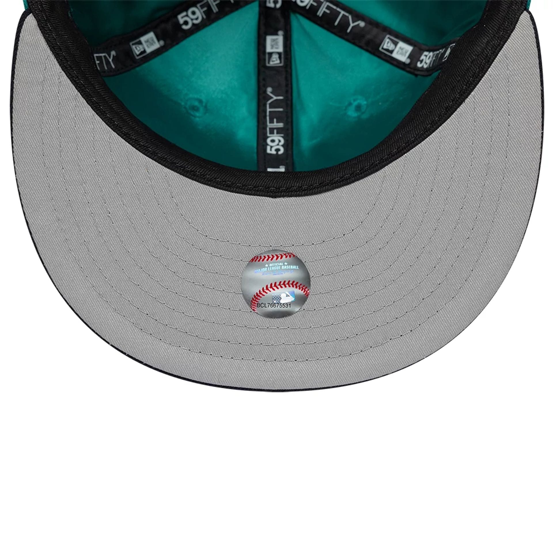 Pictured is this MLB Multi Logo Seattle Mariners 59FIFTY Fitted cap in green. 2