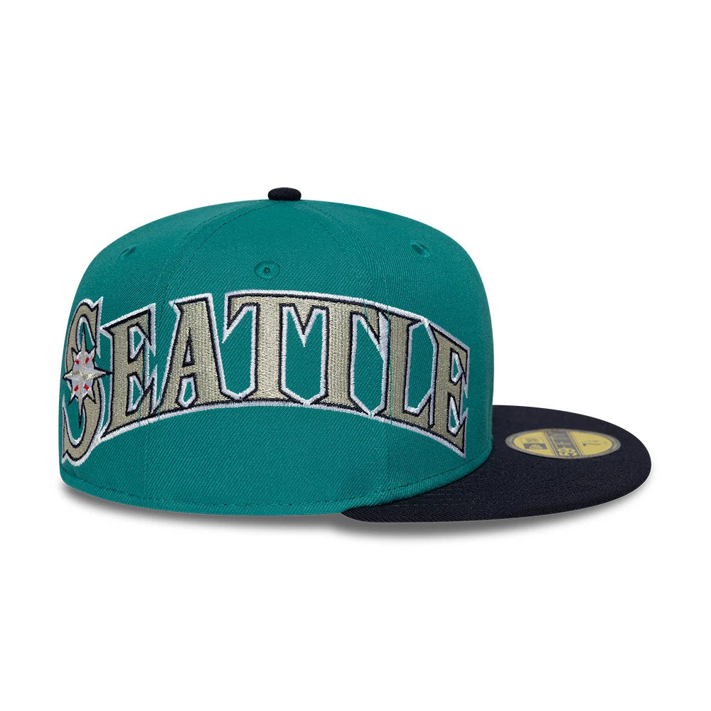Pictured is this MLB Multi Logo Seattle Mariners 59FIFTY Fitted cap in green. 6