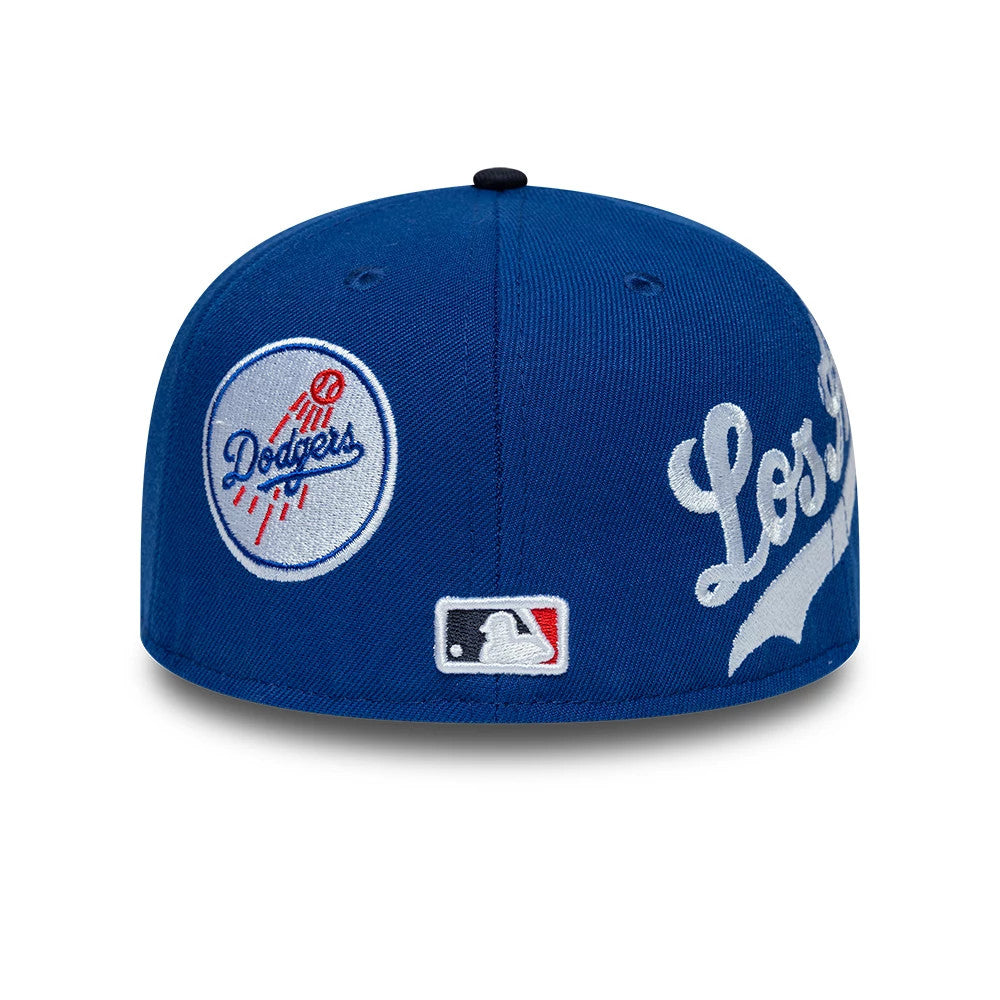 Pictured is this MLB Multi Logo LA Dodgers 59FIFTY Fitted cap in blue. 7