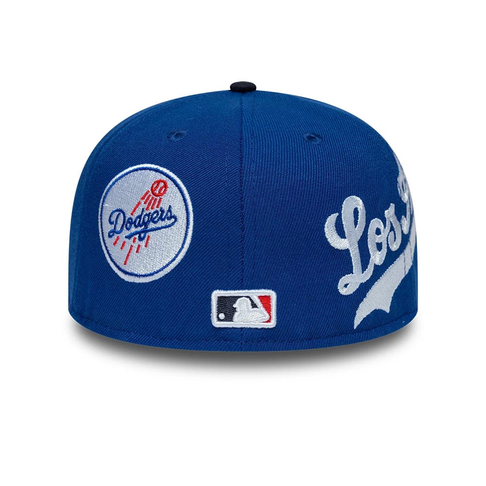 Pictured is this MLB Multi Logo LA Dodgers 59FIFTY Fitted cap in blue. 7