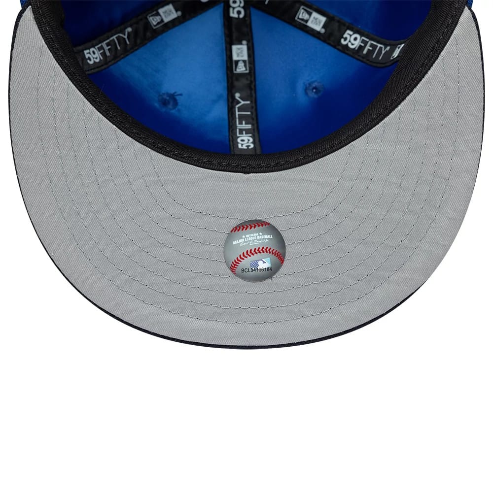 Pictured is this MLB Multi Logo LA Dodgers 59FIFTY Fitted cap in blue. 2