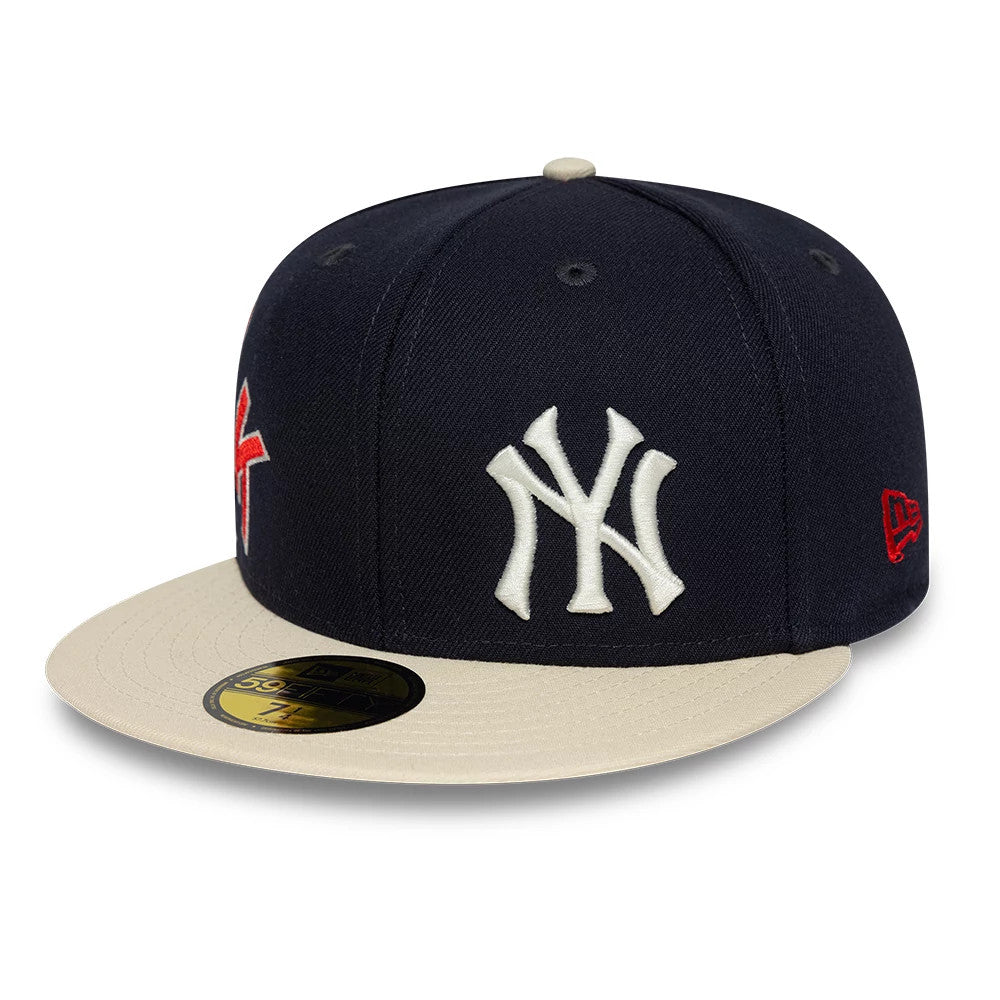 Pictured is this MLB Multi Logo New York Yankees 59FIFTY Fitted cap in navy. 4