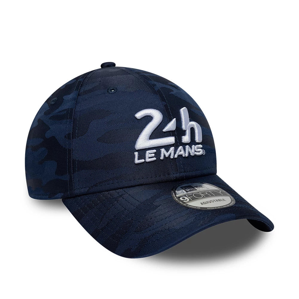 24HR Le Mans Camo Dark Blue New Era 9FORTY Adjustable Cap, front view showing the white 24h Le Mans raised embroidery on the structured blue camo crown, curved visor with a 9FORTY size sticker, and top button.
