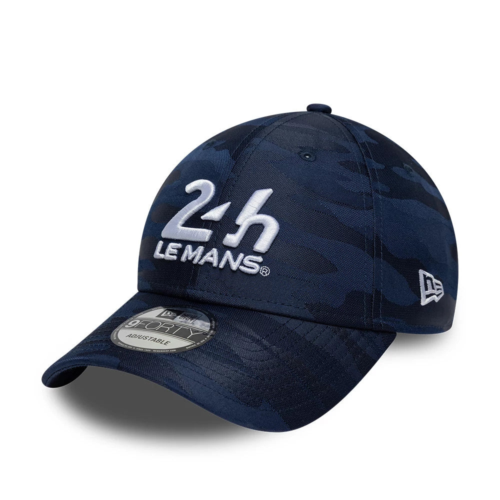 24HR Le Mans Camo Dark Blue New Era 9FORTY Adjustable Cap, three-quarter view showing the raised white embroidered 24H Le Mans logo on the front panel, the dark blue camouflage pattern.