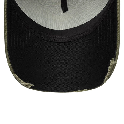 Pictured is this Washed Graphic 24HR Le Mans 9FORTY A-Frame Trucker cap in green. 5