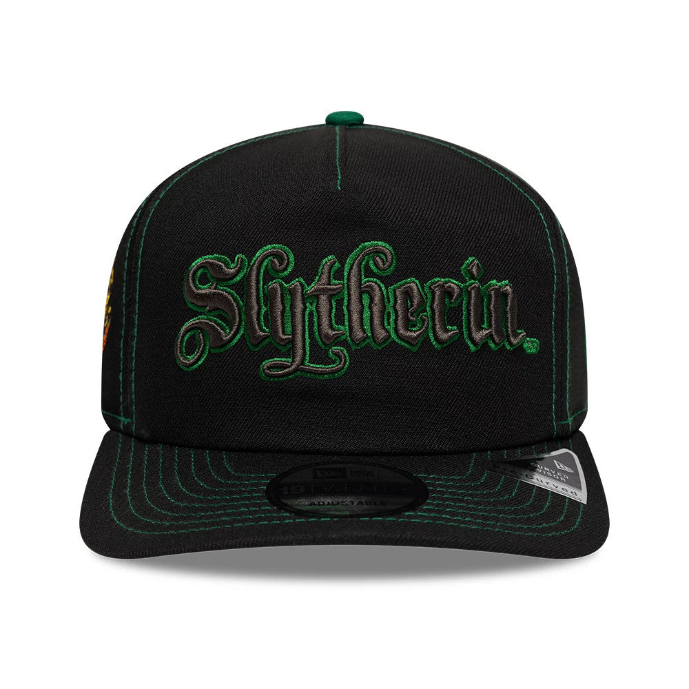 Harry Potter Slytherin Black New Era 19TWENTY Adjustable Cap, front view showing the embroidered green Slytherin script logo on the black crown, with green stitching along the structured visor and 19TWENTY size sticker on the underside.