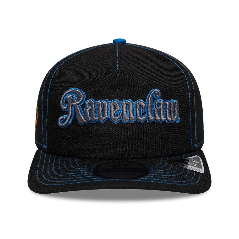 Harry Potter Ravenclaw Blue New Era 19TWENTY Adjustable Cap, front view showing the raised embroidered Ravenclaw text in blue and grey on the front panel, black visor with blue stitching, and a New Era 19TWENTY size sticker on the visor.