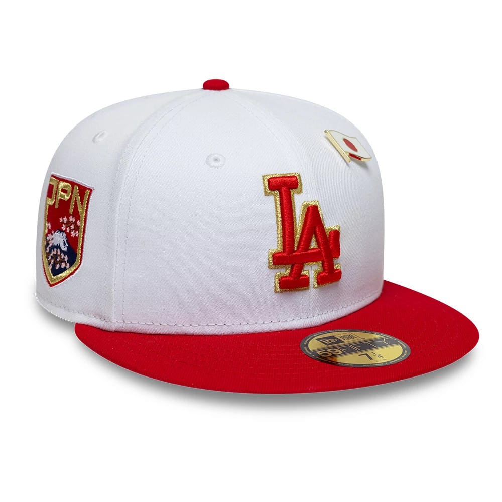 Pictured is this MLB Sister Cities LA Dodgers 59FIFTY Fitted cap in white & red. 1