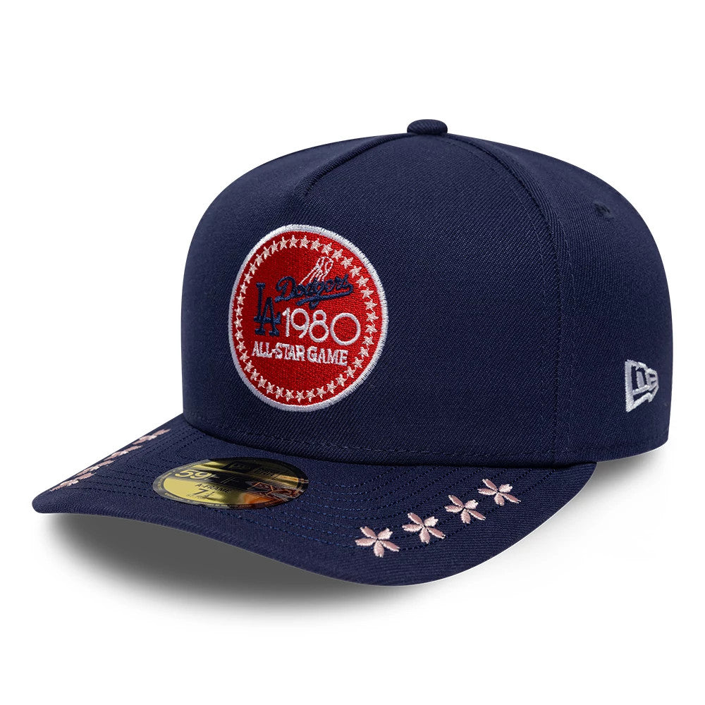 LA Dodgers MLB All Star Game Navy New Era 59FIFTY A-Frame Fitted Cap, front view showing the red, white, and blue embroidered patch on the front panel, with a gold 59FIFTY size sticker on the visor and floral embroidery.
