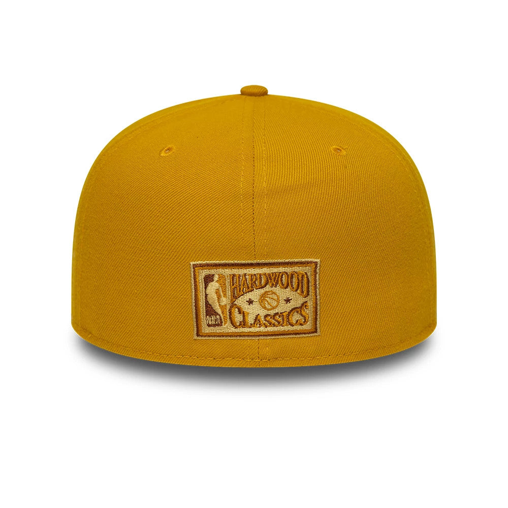 Pictured is this NBA Boston Celtics 59FIFTY A-Frame Fitted cap in gold & black. 5
