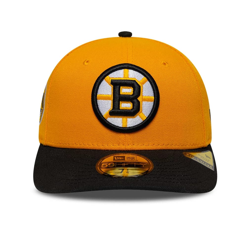 Pictured is this NHL Champions Boston Bruins 59FIFTY Fitted cap in orange & black. 3