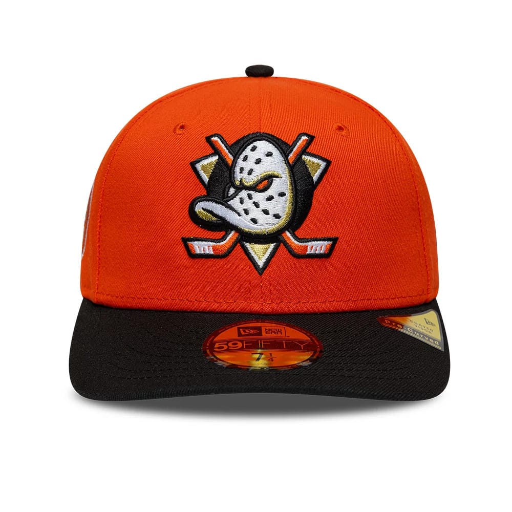 Pictured is this NHL Champions Anaheim Ducks 59FIFTY Fitted cap in orange & black. 3