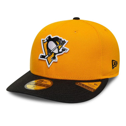 Pictured is this NHL Champions Pittsburgh Penguins 59FIFTY Fitted cap in yellow & black. 4