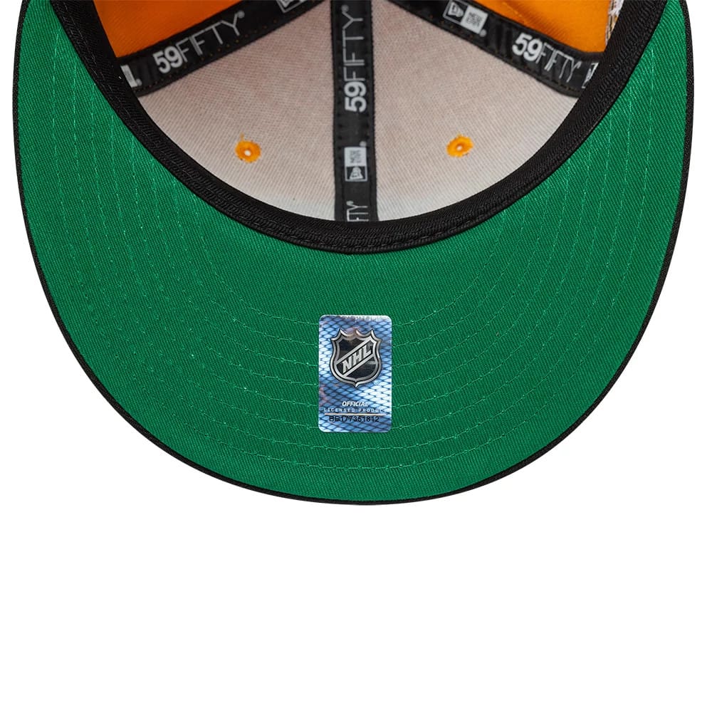Pictured is this NHL Champions Pittsburgh Penguins 59FIFTY Fitted cap in yellow & black. 2