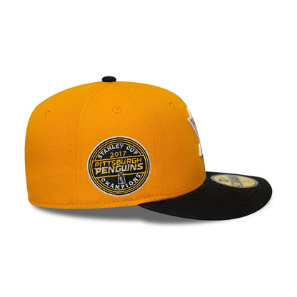 Pictured is this NHL Champions Pittsburgh Penguins 59FIFTY Fitted cap in yellow & black. 6