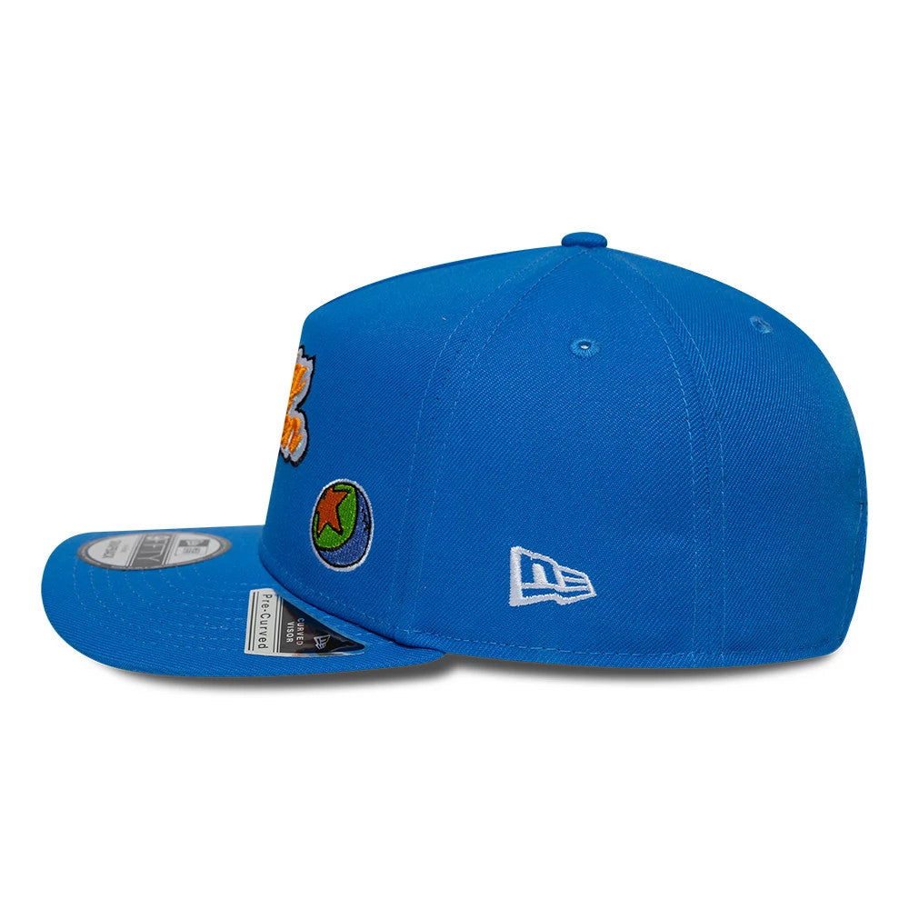 Rugrats Party In The Playpen Blue New Era 9FIFTY A-Frame Snapback Adjustable Cap, side view showing the New Era flag logo embroidered in white on the left side, with colourful Rugrats embroidery on the front blue structured crown.