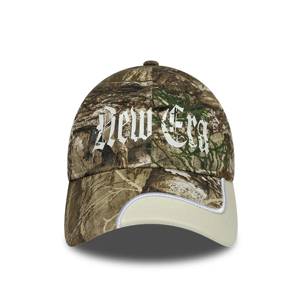 Pictured is this New Era Real Tree 9TWENTY cap in assorted print. 2