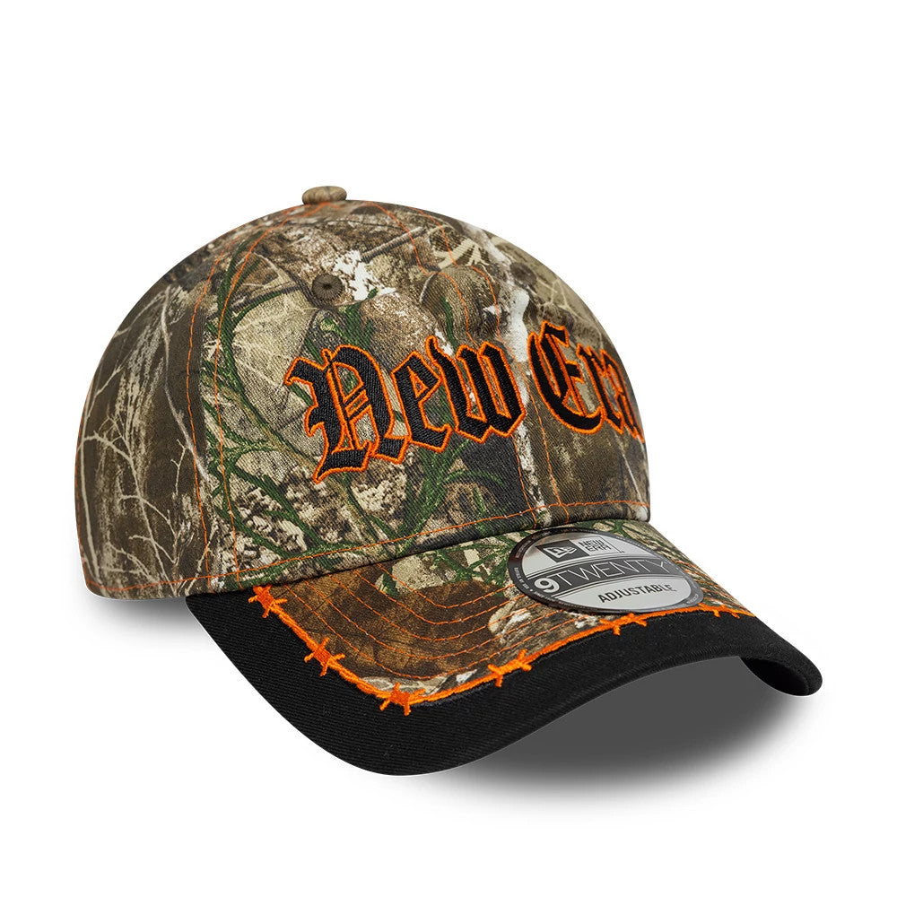 Pictured is this New Era Real Tree 9TWENTY cap in assorted print. 4