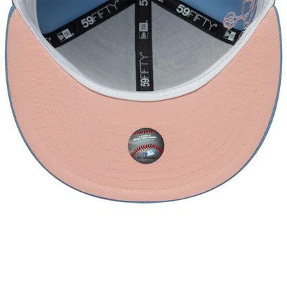 Pictured is this MLB Floral Outline LA Dodgers 59FIFTY Fitted cap in pastel blue. 2