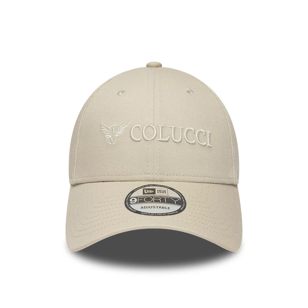 Colucci X New Era Light Beige 9FORTY Adjustable Cap, front view showing the raised embroidered Colucci logo with an eagle graphic on the front panel, a curved visor and a 9FORTY size sticker on the visor.