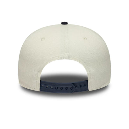 Pictured is this New Era Buffalo 19TWENTY cap in cream & navy. 4