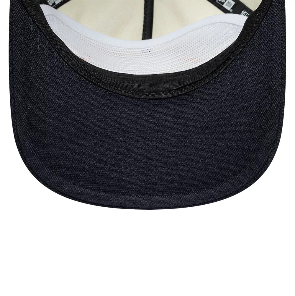 Pictured is this New Era Buffalo 19TWENTY cap in cream & navy. 7