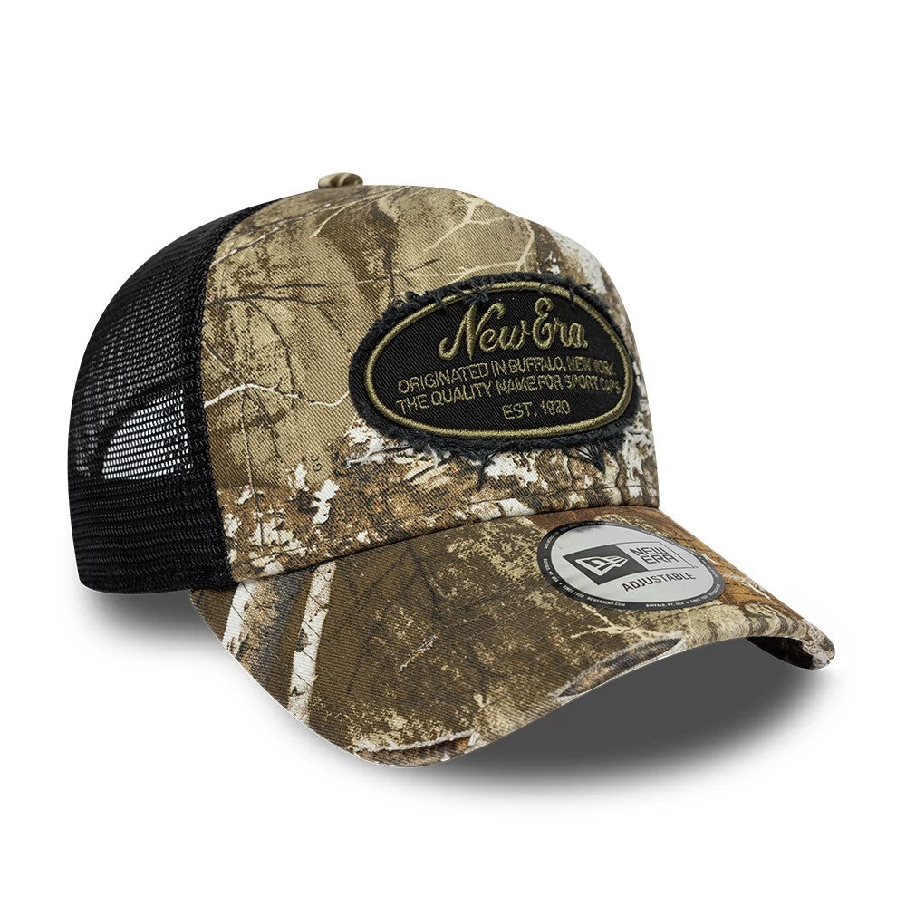 Pictured is this New Era Heritage Patch 9FORTY A-Frame Trucker cap in Realtree camo. 3
