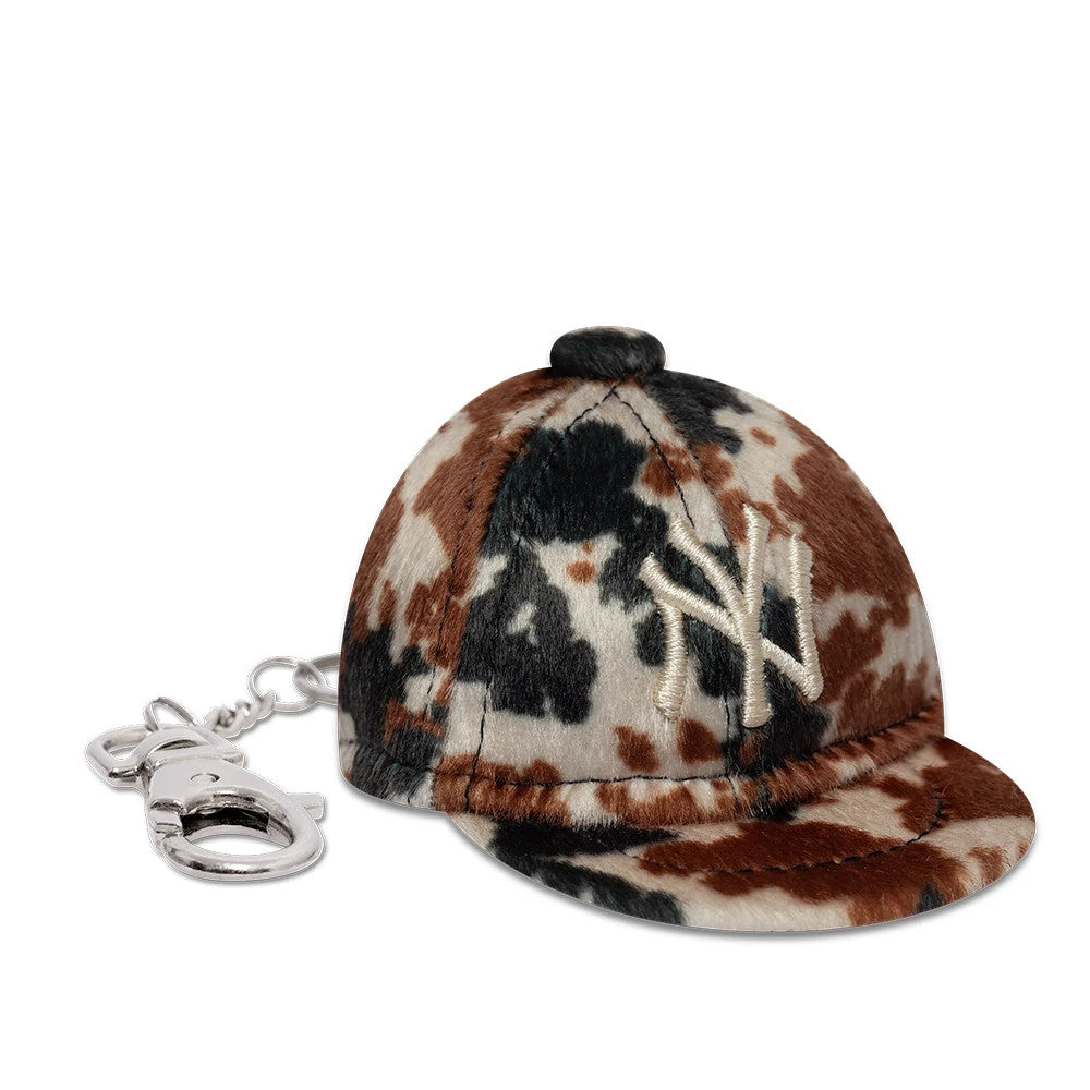 Pictured is this MLB Animal Mini Cap New York Yankees Key Chain in brown. 3
