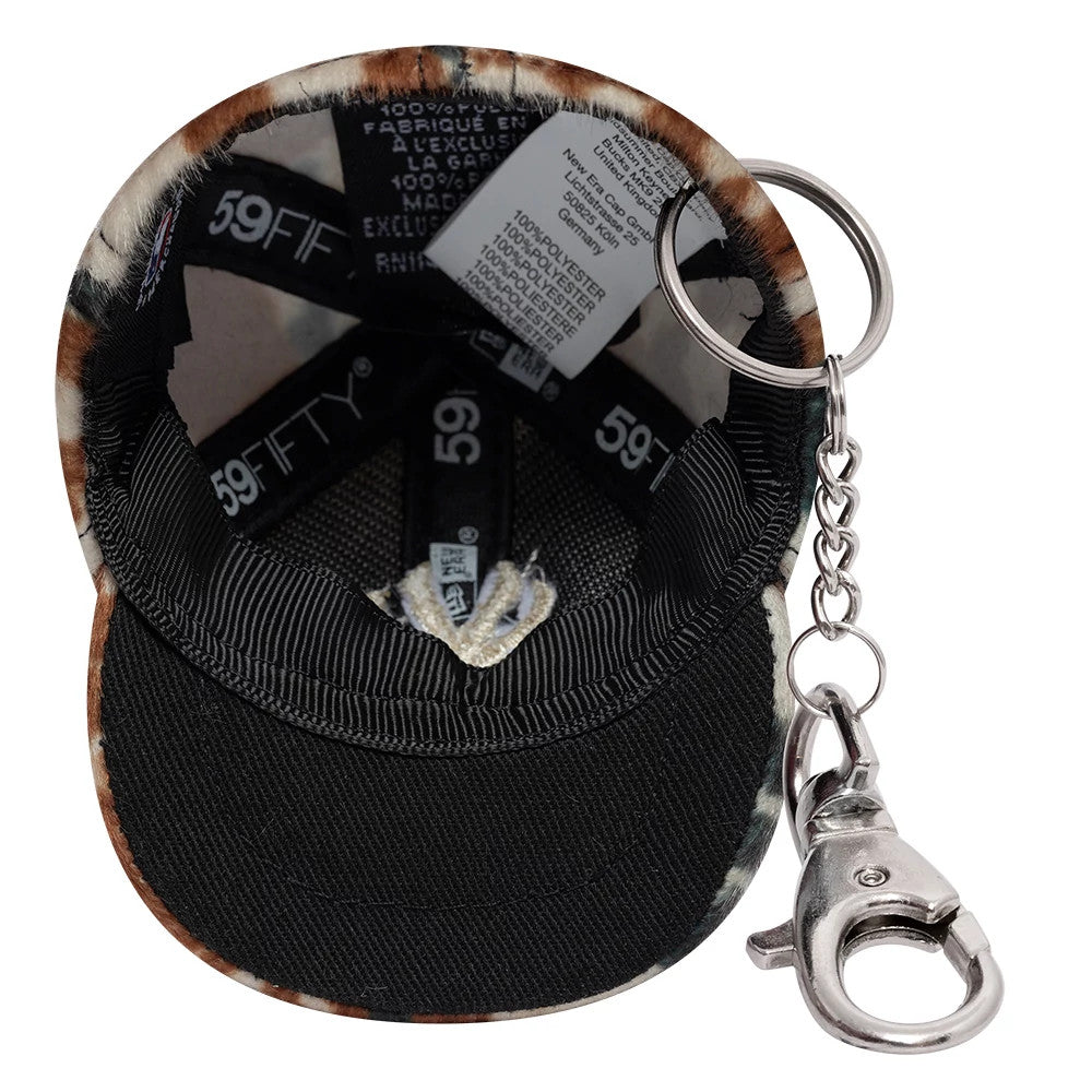 Pictured is this MLB Animal Mini Cap New York Yankees Key Chain in brown. 5
