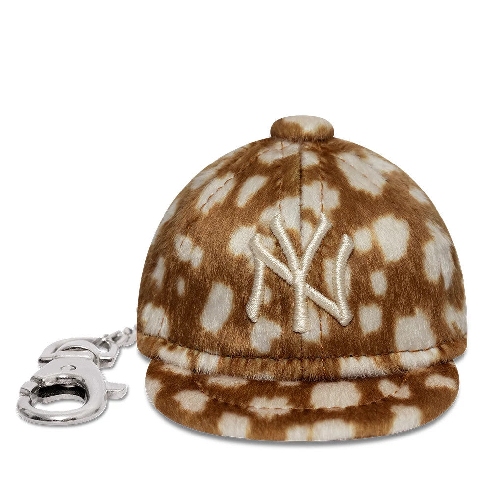Pictured is this MLB Animal Mini Cap New York Yankees Key Chain in light brown. 2