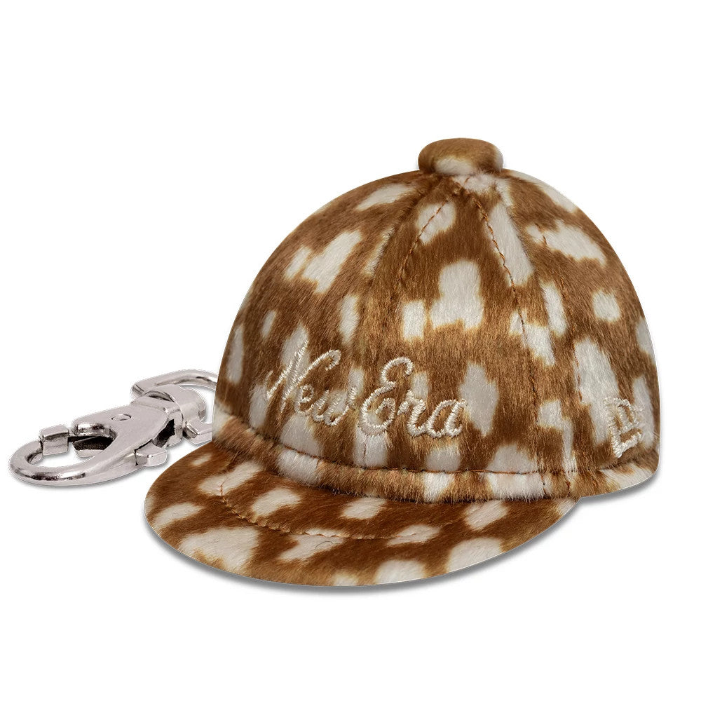 Pictured is this MLB Animal Mini Cap New Era Key Chain in Cow Print. 1