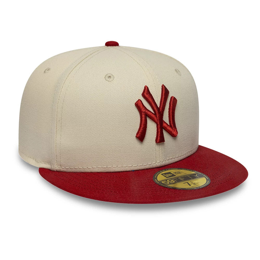 Pictured is this MLB League Essential New York Yankees 59FIFTY Fitted cap in cream & red. 3