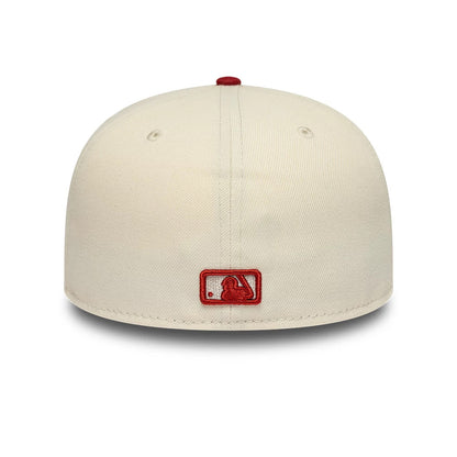 Pictured is this MLB League Essential New York Yankees 59FIFTY Fitted cap in cream & red. 4
