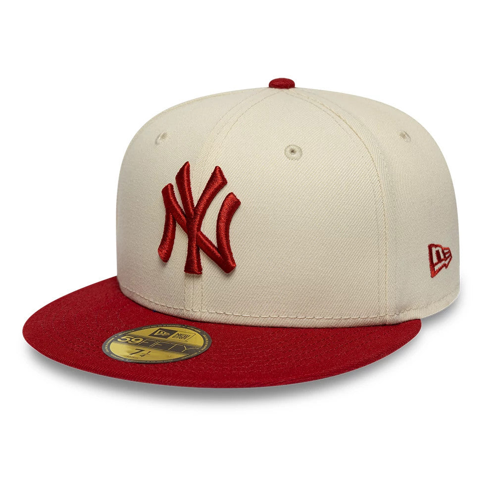 Pictured is this MLB League Essential New York Yankees 59FIFTY Fitted cap in cream & red. 1