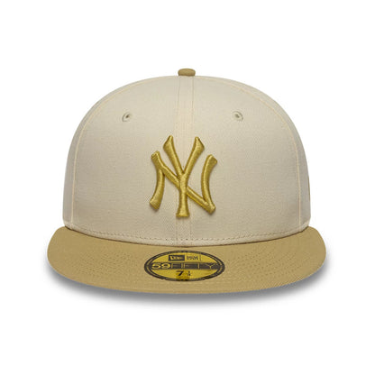 Pictured is this MLB League Essential New York Yankees 59FIFTY Fitted cap in cream & gold. 2
