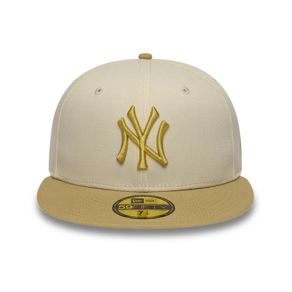 Pictured is this MLB League Essential New York Yankees 59FIFTY Fitted cap in cream & gold. 2