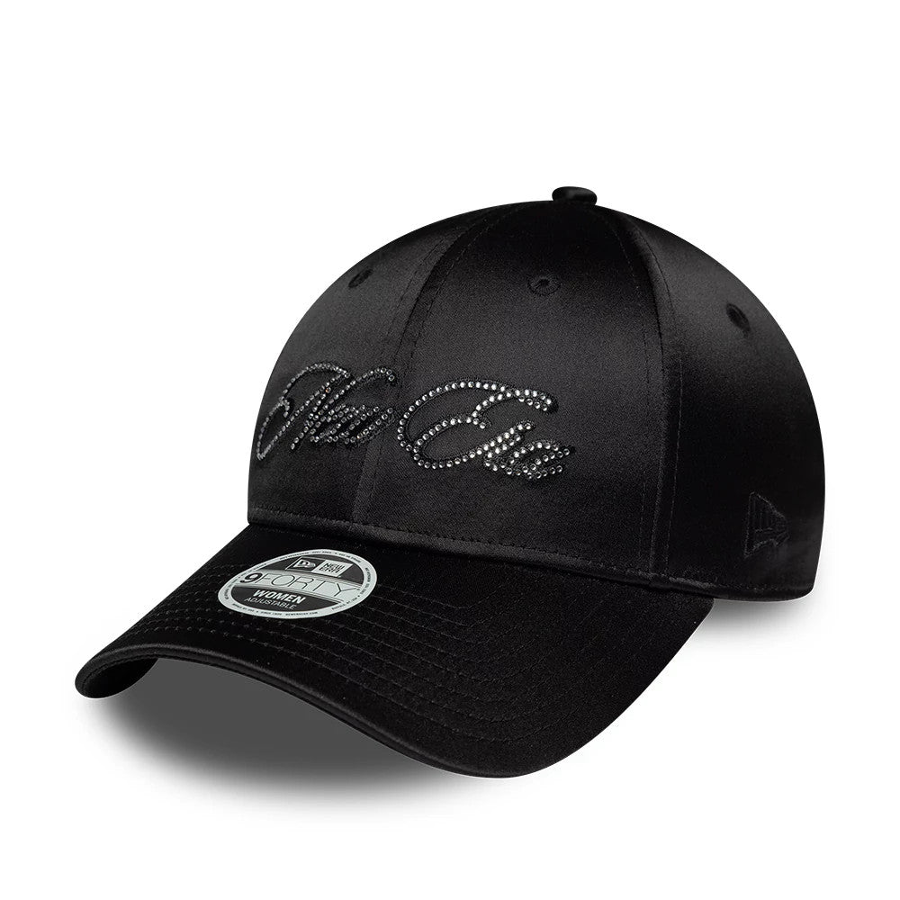 Womens New Era Satin Gem Black 9FORTY Adjustable Cap, three-quarter view showing rhinestone-embellished New Era lettering on the front panels, a curved black visor with a grey 9FORTY size sticker, and the New Era flag logo on the left side.