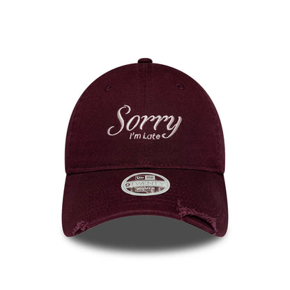 Pictured is this Womens New Era Slogan 9TWENTY cap in dark purple. 2
