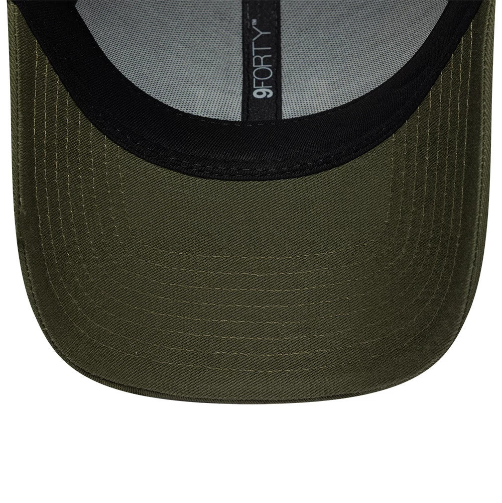 Pictured is this New Era Gem Patch Distress 9FORTY cap in green. 5