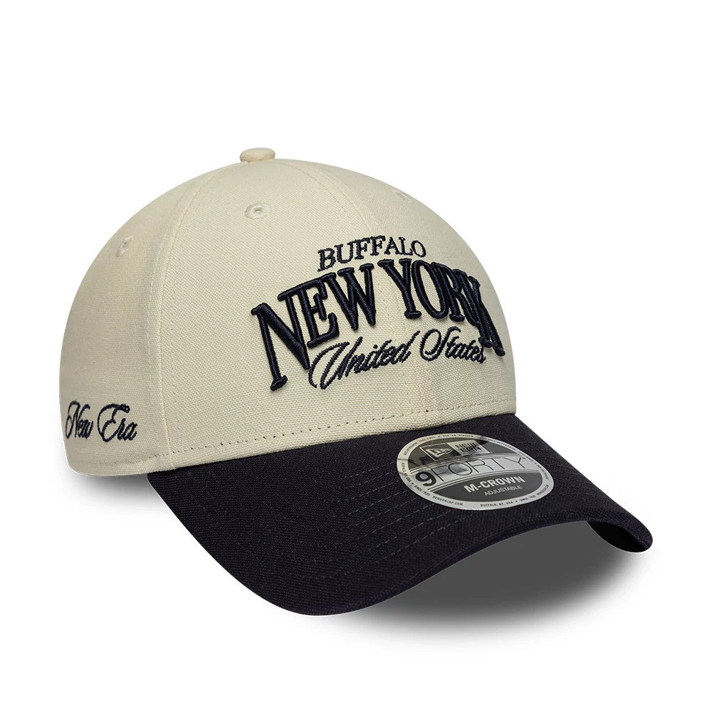 New Era New York Light Beige & Black 9FORTY M-Crown Adjustable Cap, front view showing raised black embroidered Buffalo New York United States text on light beige panels, a black curved visor, and a 9FORTY size sticker on the visor.
