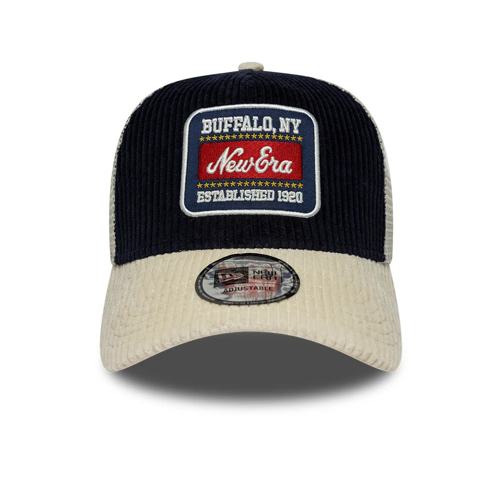 Pictured is this New Era Cord Visor 9FORTY E-Frame Trucker cap in navy. 2